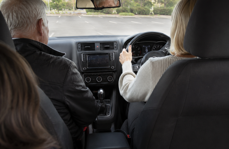 Occupational therapist conducting a driving assessment and reviewing car modifications on the Sunshine Coast